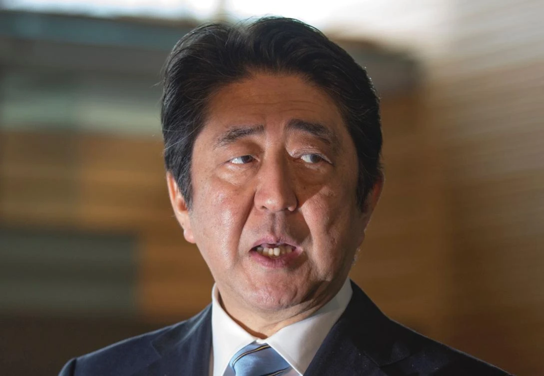 Japan's Prime Minister Shinzo Abe speaks to reporters at his official residence in Tokyo on April 5, 2017, after North Korea launched a ballistic missile into the Sea of Japan. (AFP)