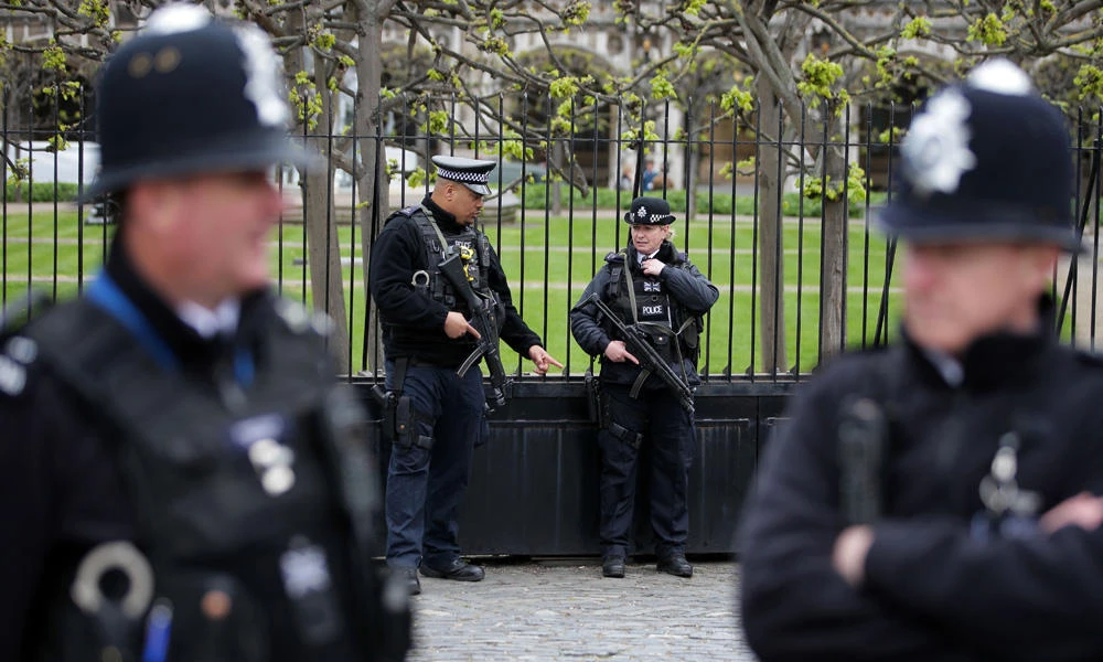 British police officers they stand on duty in central London on April 12, 2017. (AFP file photo)
