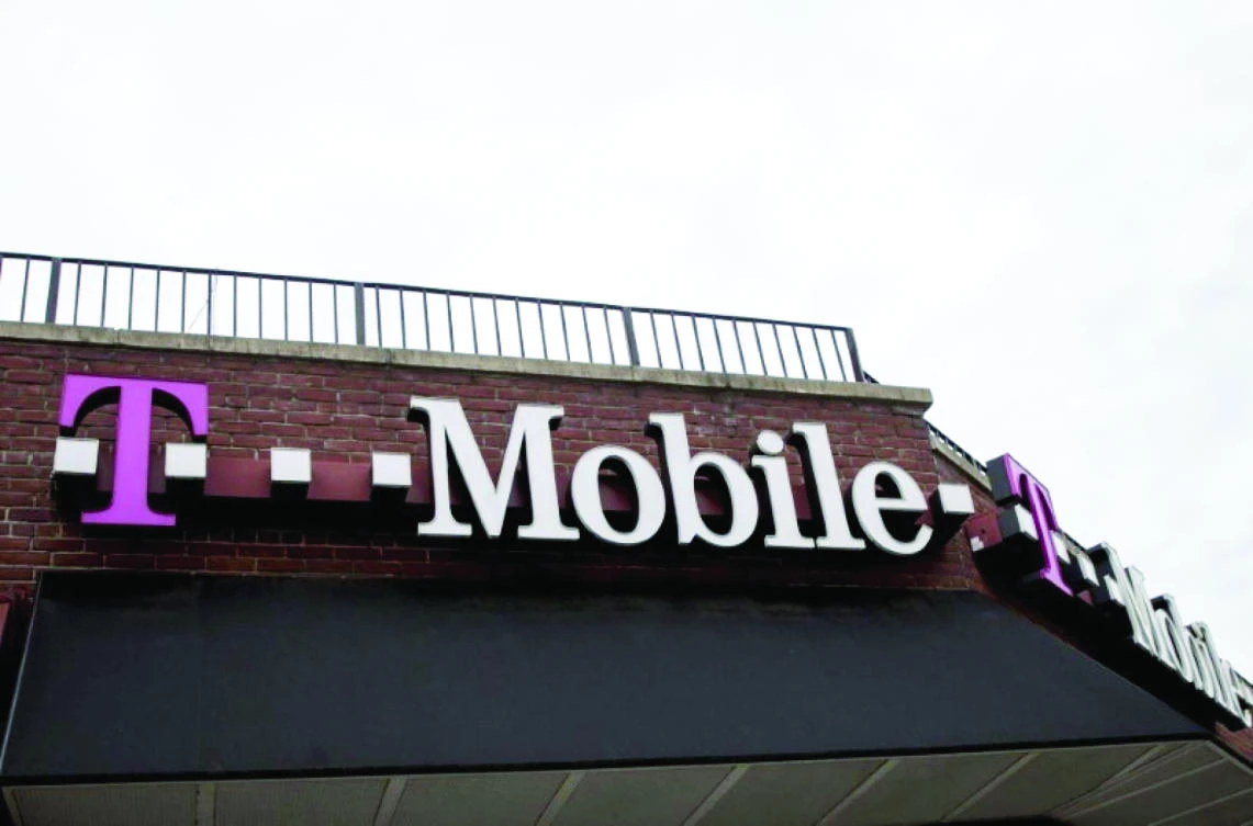 Price wars between Sprint and T-Mobile have helped to lower wireless prices for consumers so regulators
may be reluctant to remove that competition. (Reuters)