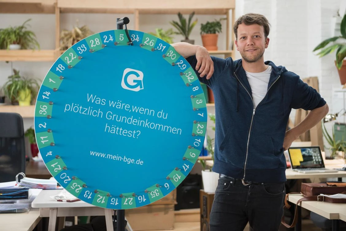 Michael Bohmeyer, founder of startup “Mein Grundeinkommen” (My Basic Income) which raffles an unconditional basic income poses for
a photo at his office in Berlin. (AFP)