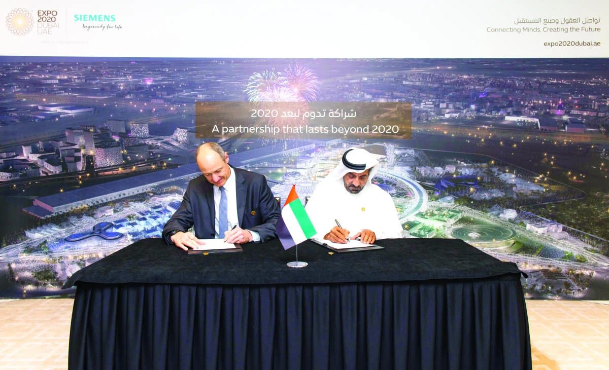 Roland Busch, managing board member and chief technology officer, Siemens, left, and Sheikh Ahmed bin Saeed Al-Maktoum, chairman of Expo 2020 Dubai higher committee.