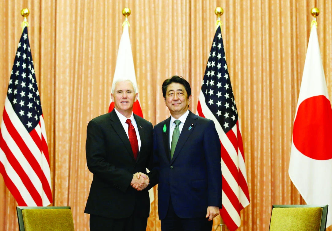 US Vice President Mike Pence, left, meets with Japan's Prime Minister Shinzo Abe in Tokyo on Tuesday. (Reuters)