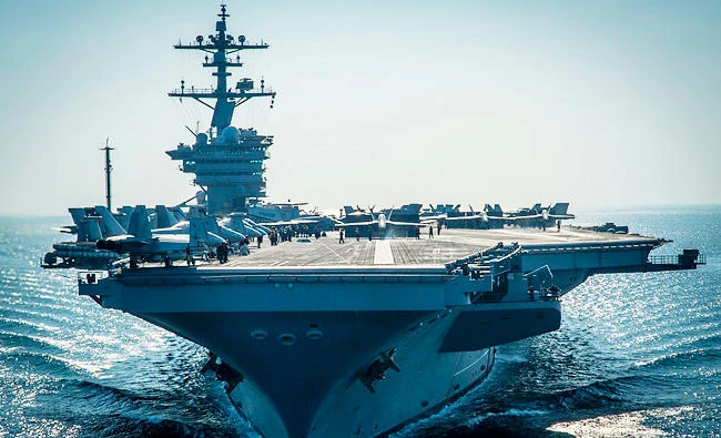 This December 8, 2014 file photo shows the Nimitz-class aircraft carrier USS Carl Vinson (CVN 70) preparing for flight operations in the Arabian Gulf. (AFP)
