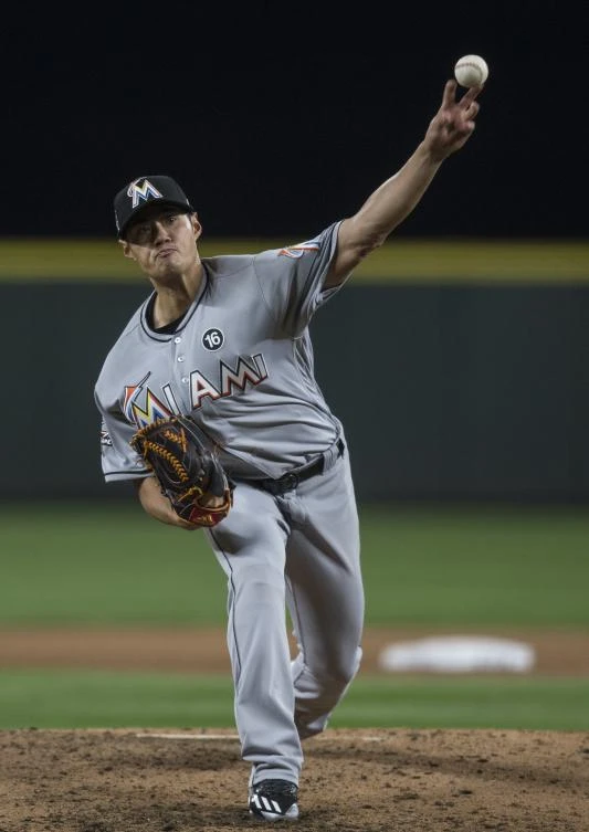 Wei-Yin Chen, of the Miami Marlins, delivers a pitch during the sixth inning of a game against the Seattle Mariners at Safeco Field on Tuesday in Seattle, Washington. The Marlins won the game 5-0 and Chen pitched seven no-hit innings. (AFP)