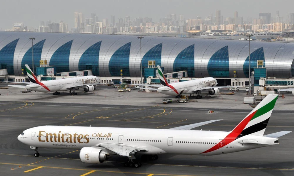 An Emirates plane taxis to a gate at Dubai International Airport at Dubai International Airport in Dubai on March 22, 2017. (AP Photo/Adam Schreck, File)