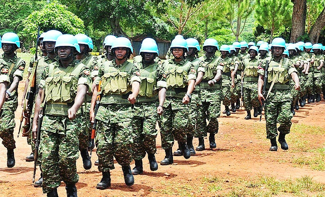 Uganda People Defence Forces (UPDF) soldiers parade during a passing out ceremony, in this April 16, 2014 file photo, at the Singo military training school, northwest of Uganda's capital Kampala. (AFP)