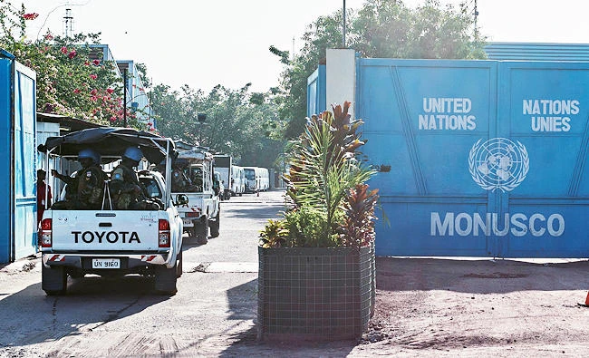 Peacekeepers serving in the United Nations Organization Stabilization Mission in the Democratic Republic of the Congo (MONUSCO) drive into their compound after patrolling the streets during mass protests against President Joseph Kabila in the streets of the Democratic Republic of Congo's capital Kinshasa, in this April 10, 2017 photo. (REUTERS)