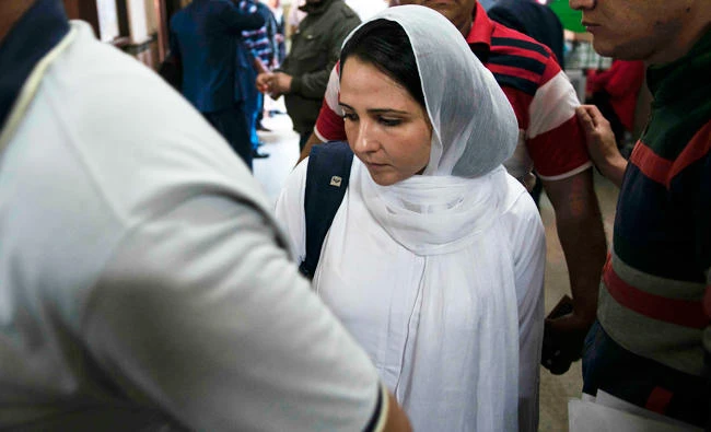 US-Egyptian charity worker Aya Hejazi (C) arrives at the court for her trial in Cairo, in this April 16, 2017 photo. (AFP)