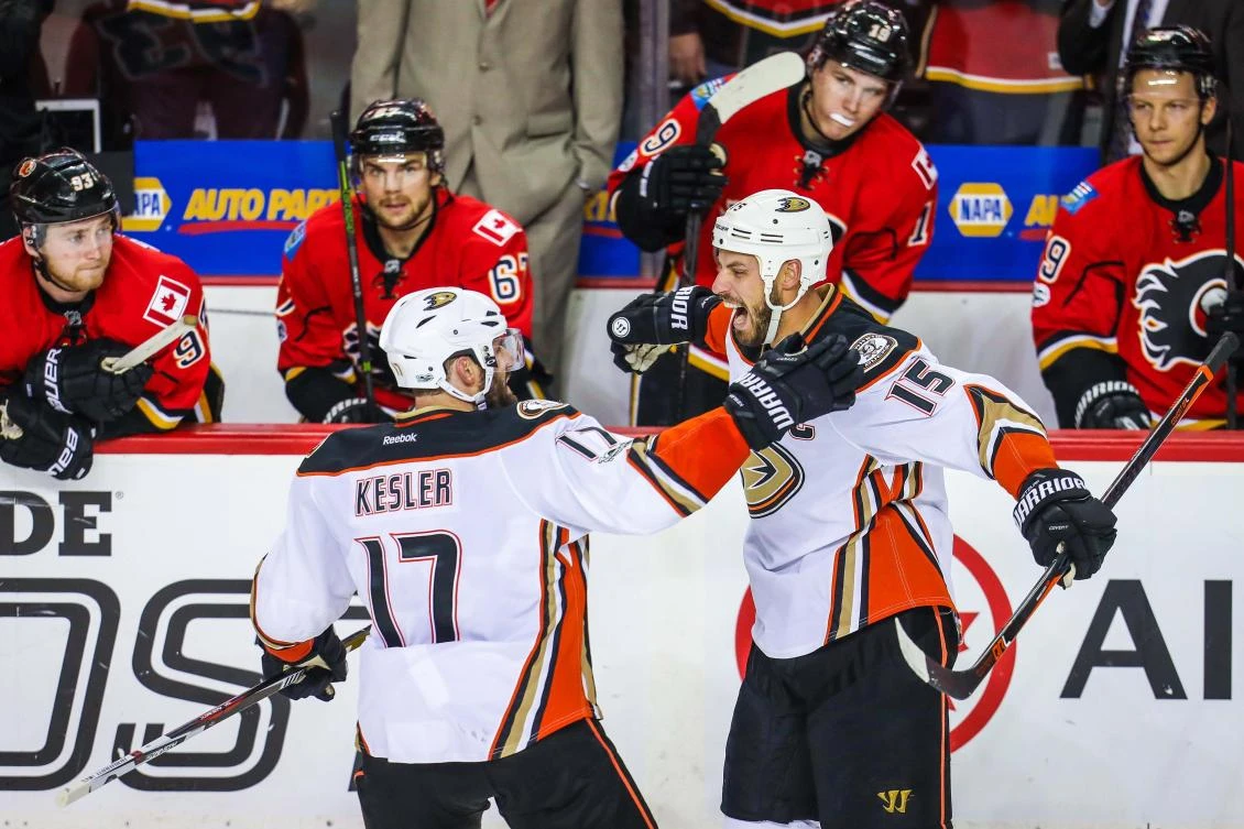 Anaheim Ducks center Ryan Getzlaf (15) celebrates his goal with center Ryan Kesler (17) in front of Calgary Flames players during the third period in Game of of the first round of the 2017 Stanley Cup Playoffs at Scotiabank Saddledome Wednsday. Anaheim Ducks won 3-1. (USA TODAY Sports(