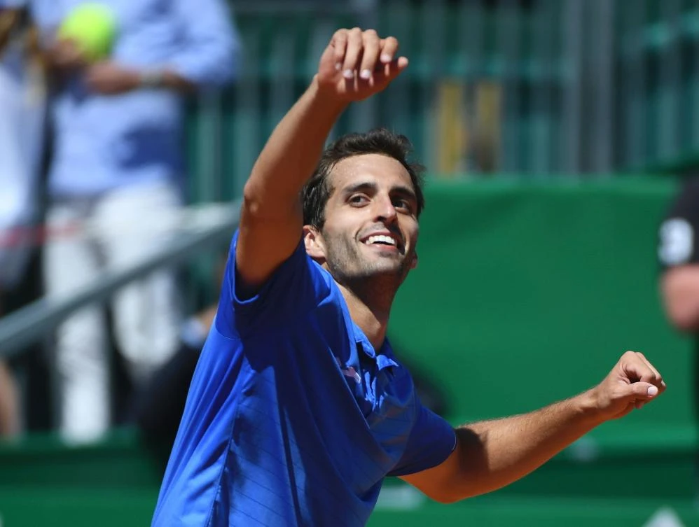 Spain's Albert Ramos-Vinolas celebrates his victory over Britain's Andy Murray at the end of their Monte-Carlo ATP Masters Series tennis tournament on Thursday in Monaco. (AFP)