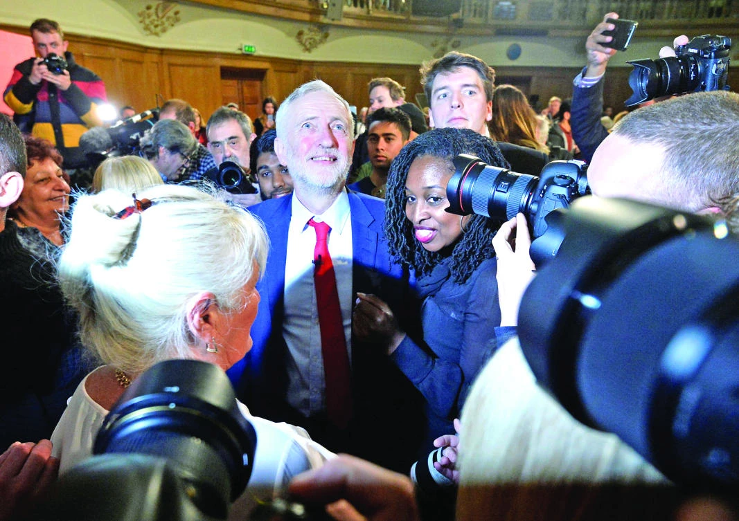 Labour Party leader Jeremy Corbyn leaves after giving a speech in central London, on Thursday. (Reuters)