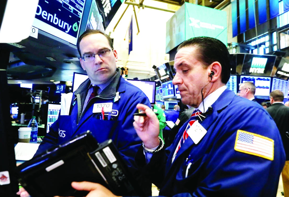 Traders work on the floor of the New York Stock Exchange. (Reuters)