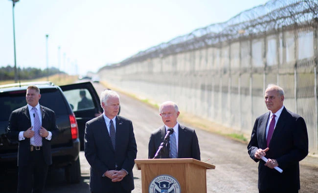 Department of Homeland Security John Kelly and Attorney General Jeff Session speak to the media during a tour of the border and immigrant detention operations at Brown Field Station on Friday in Otay Mesa, California. (AFP)
