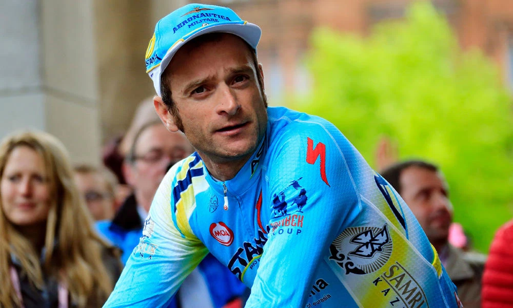 This file photo taken on May 08, 2014 shows Italian cyclist Michele Scarponi of the Astana team during the presentation of the teams for the 97th Giro d'Italia, Tour of Italy in Belfast on May 8, 2014. Scarponi died Saturday after being hit by a truck during a training in Italy. (AFP / LUK BENIES)