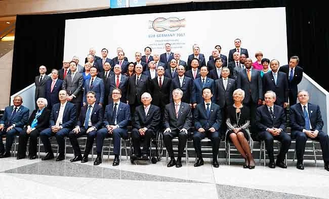 Finance Ministers and Central Bank Governors pose for the Family Photo during the G20 at the 2017 World Bank Group Spring Meetings in Washington, on April 21, 2017. (AP)