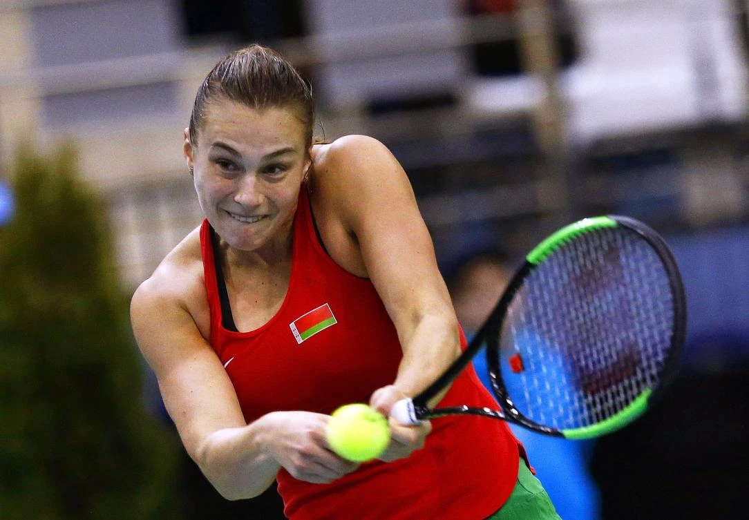 Aryna Sabalenka of Belarus in action against Viktorija Golubic of Switzerland during their singles match of the Fed Cup 2017 World Group semifinal tie between Belarus and Switzerland in Minsk, Belarus, on Sunday. (EPA)