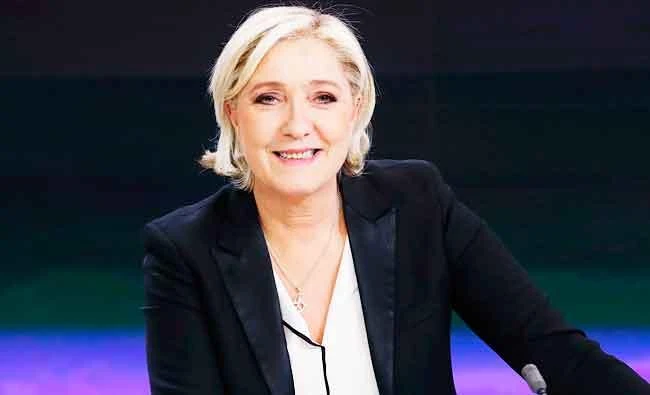 French presidential election candidate for the far-right Front National (FN) party Marine Le Pen waits before an interview on the set of the France 2 TV channel on Monday in Paris. (AFP)