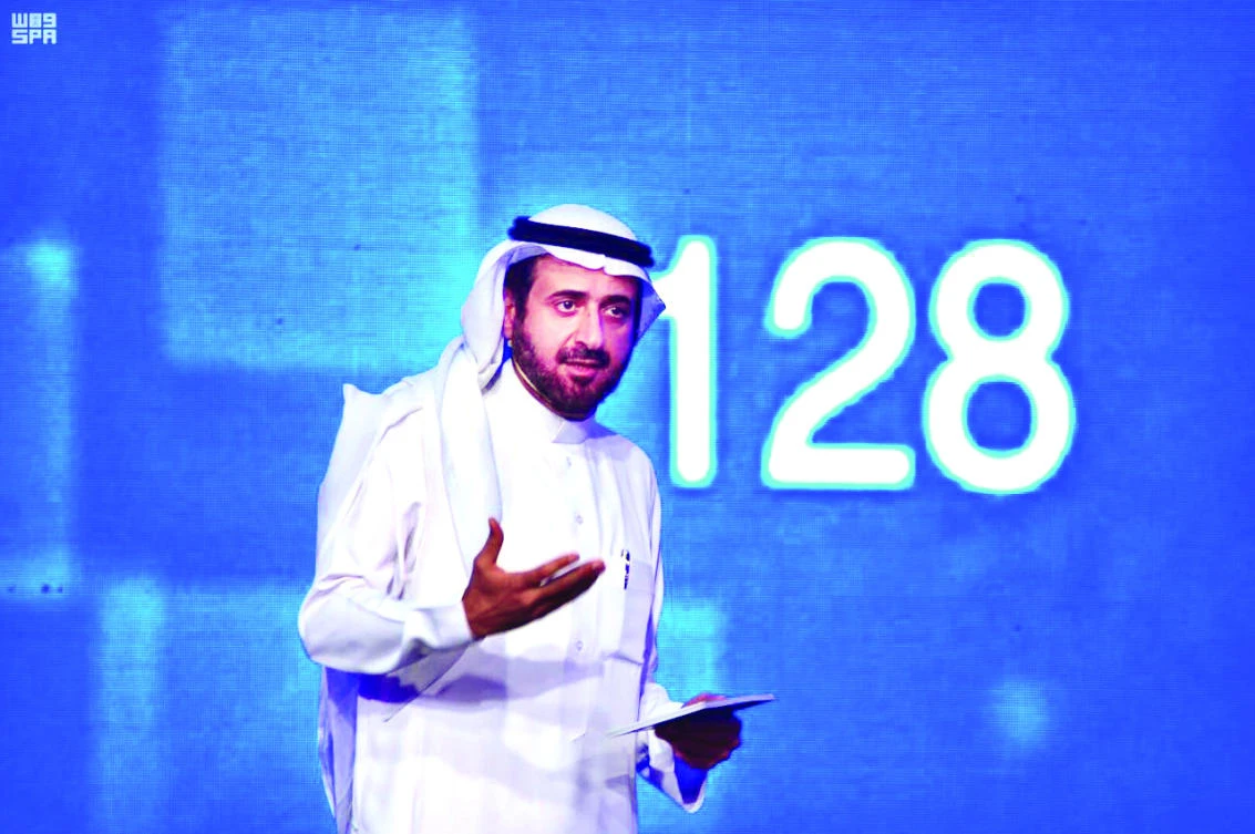 Health Minister Tawfiq Al-Rabiah speaks on his ministry’s initiative “The Health Care Model,” at Princess Nourah bint Abdulrahman University on Sunday. (SPA)