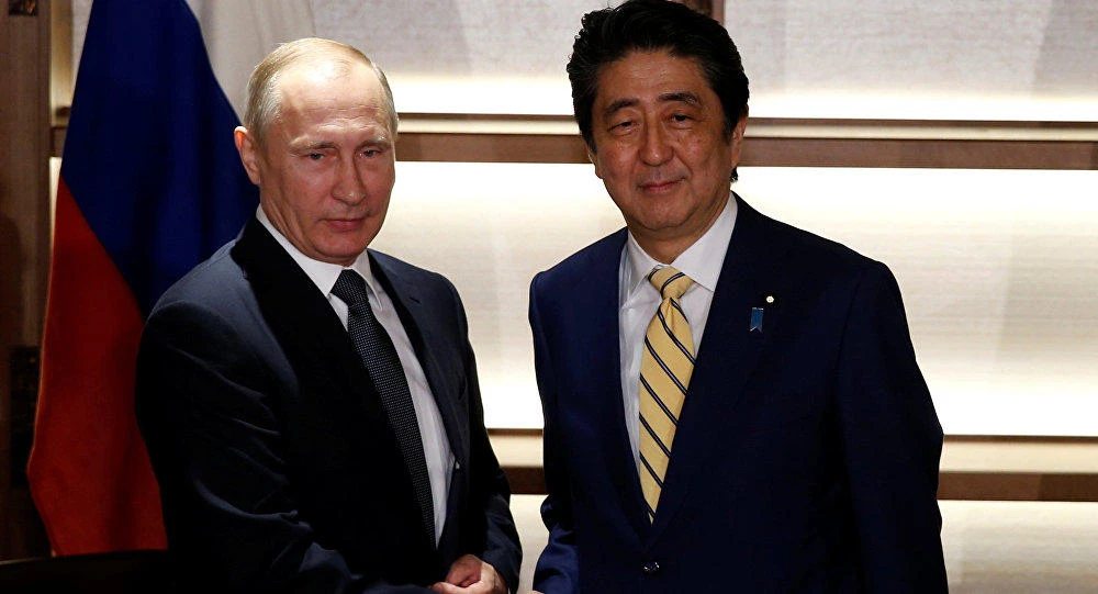 Japan Prime Minister Shinzo Abe and Vladmir Putin. (REUTERS)