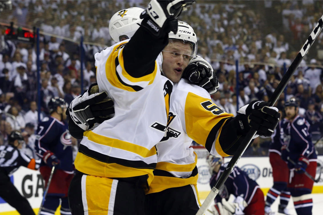 Pittsburgh Penguins center Jake Guentzel, right, and center Sidney Crosby celebrate Guentzel's game winner during overtime in Game 3 of the first round of the 2017 Stanley Cup Playoffs against the Columbus Blue Jackets at Nationwide Arena last week. Pittsburgh defeated Columbus 5-4 in overtime. (USA TODAY Sports)
