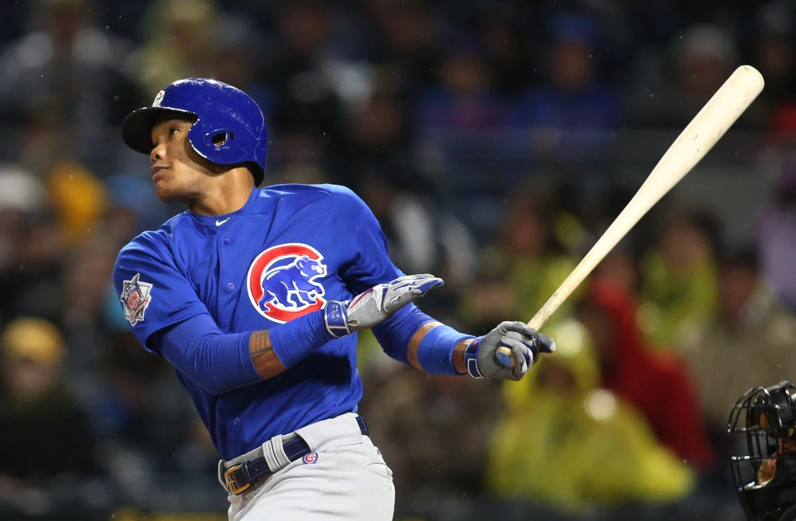 Chicago Cubs shortstop Addison Russell hits his third single of the game against the Pittsburgh Pirates during the third inning at PNC Park on Monday. (USA TODAY Sports)