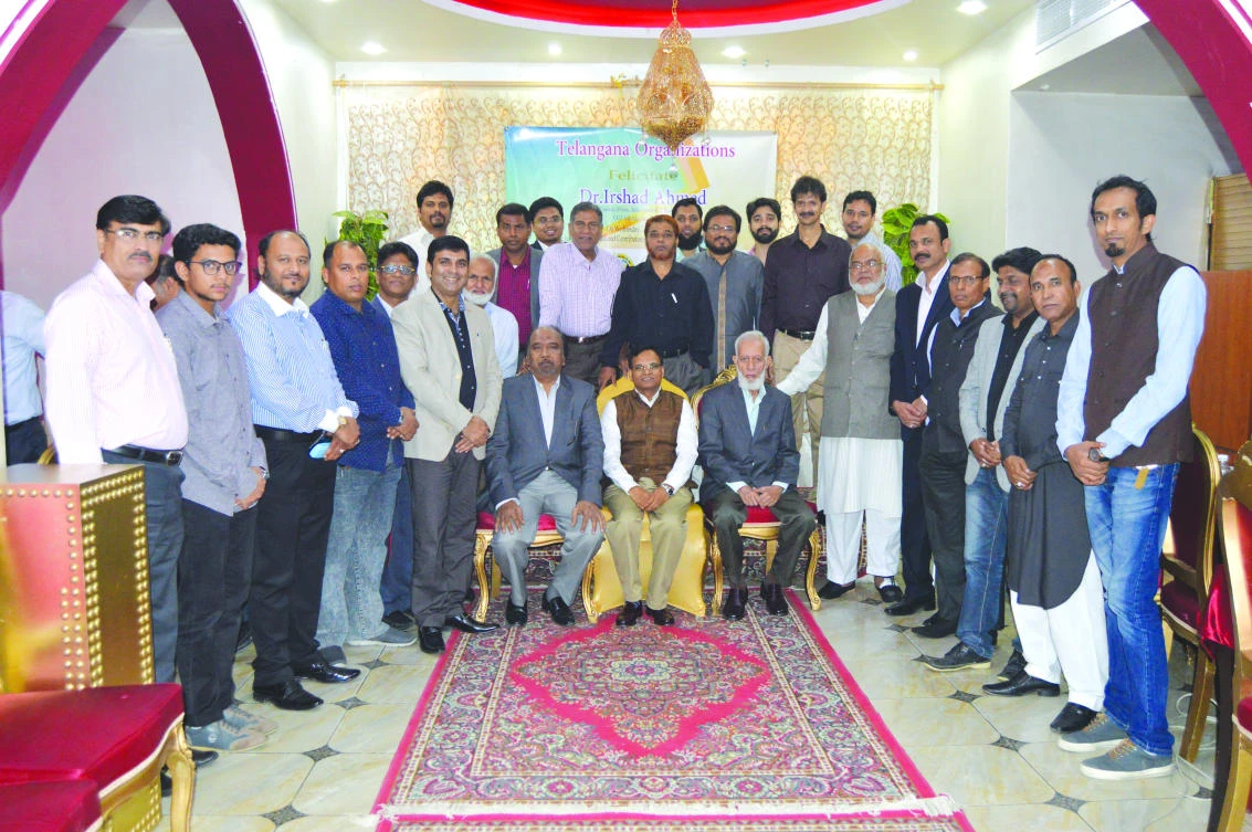 Dr. Irshad Ahmed (seated, center) with leading members of the Indian community in Jeddah at the farewell event.