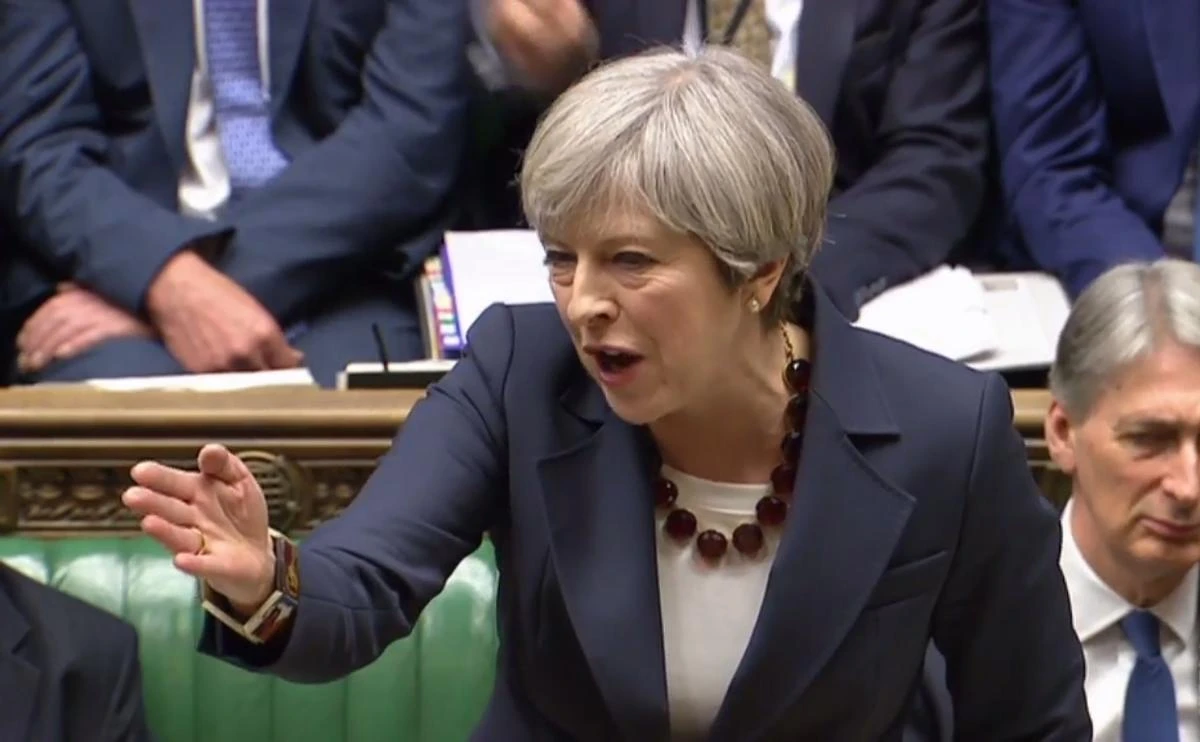 British Prime Minister Theresa May speaking during the weekly Prime Ministers Questions session in the House of Commons in London. (AFP/PRU)