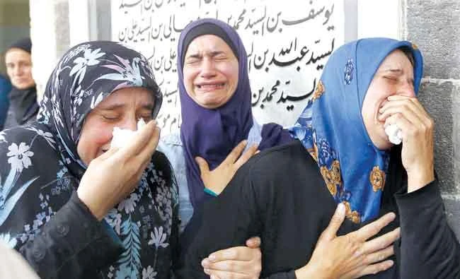 Women cry during a funeral ceremony at the Sayyida Zeinab Mosque on the outskirts of Damascus for the victims of a bombing that targeted buses carrying evacuees from the besieged regime-held towns of Foua and Kfraya. (AFP)