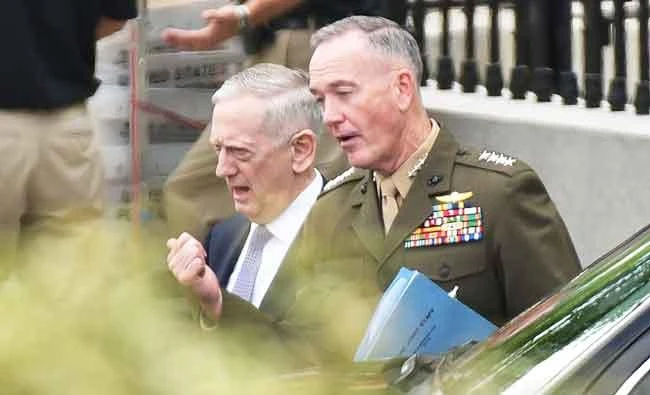 Trump team softens war talk, vows other pressure on N.Korea