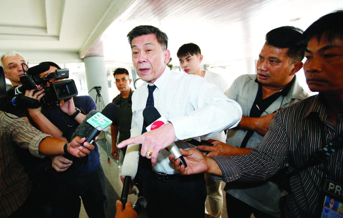 Director-General of South Bangkok Prosecutor’s Office Suthi Kittisupaporn talks to reporters at South Bangkok prosecutor's office in Bangkok on Thursday. (AP)