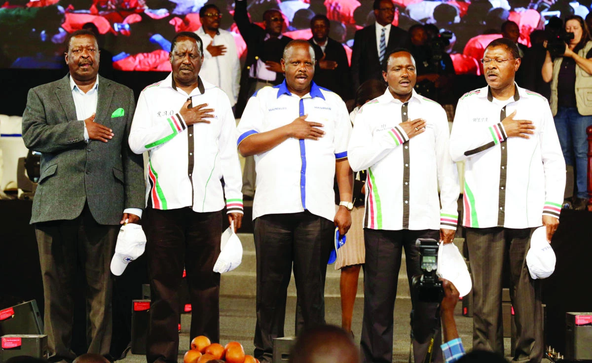 Kenyan opposition leaders from left: Musalia Mudavadi, Raila Odinga, Isaac Ruto, Kalonzo Musyoka, and Moses Wetangula sing the national anthem as they announce their National Super Alliance coalition for the 2017 general elections in Nairobi earlier this month. (Reuters)