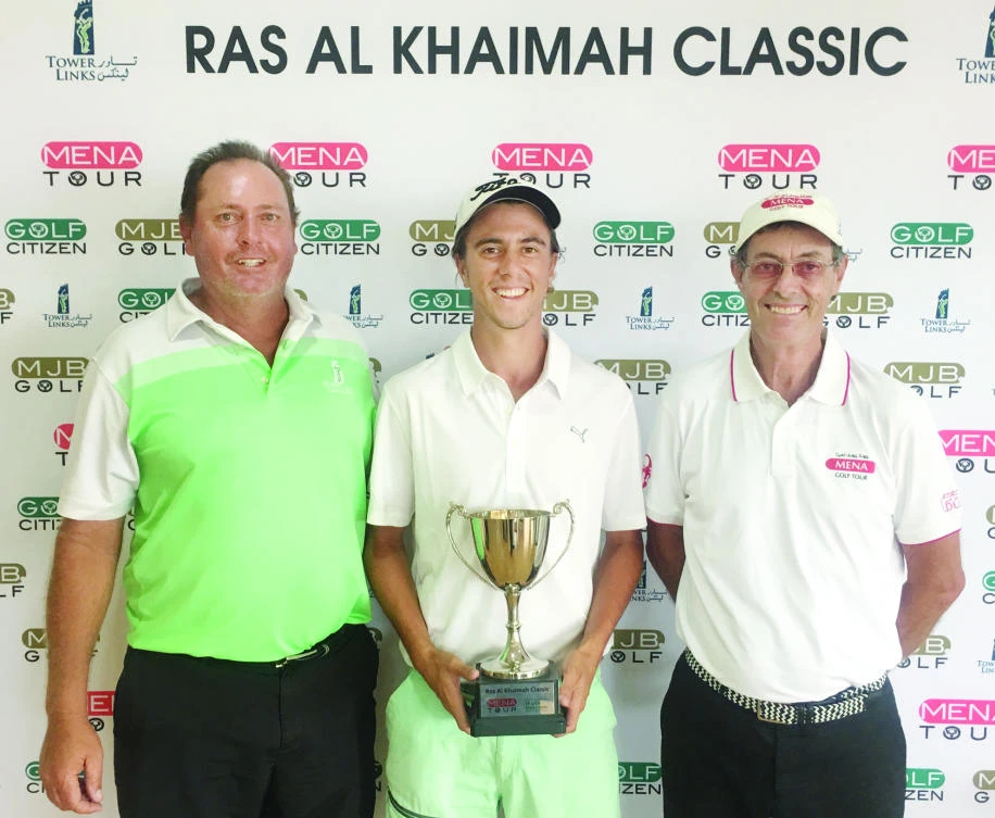 Ras Al-Khaimah Classic winner Peter Stojanovski with Simon Payne, general manager of Tower Links Golf Club, and Trevor Varri of MENA Tour. (AN photo)