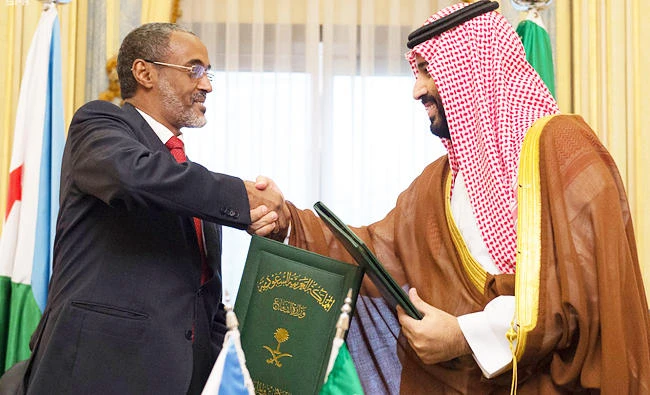 Deputy Crown Prince Mohammed bin Salman shakes hands with Djibouti’s Defense Minister Ali Hasan Bahdon after signing agreement in Riyadh. (SPA)
