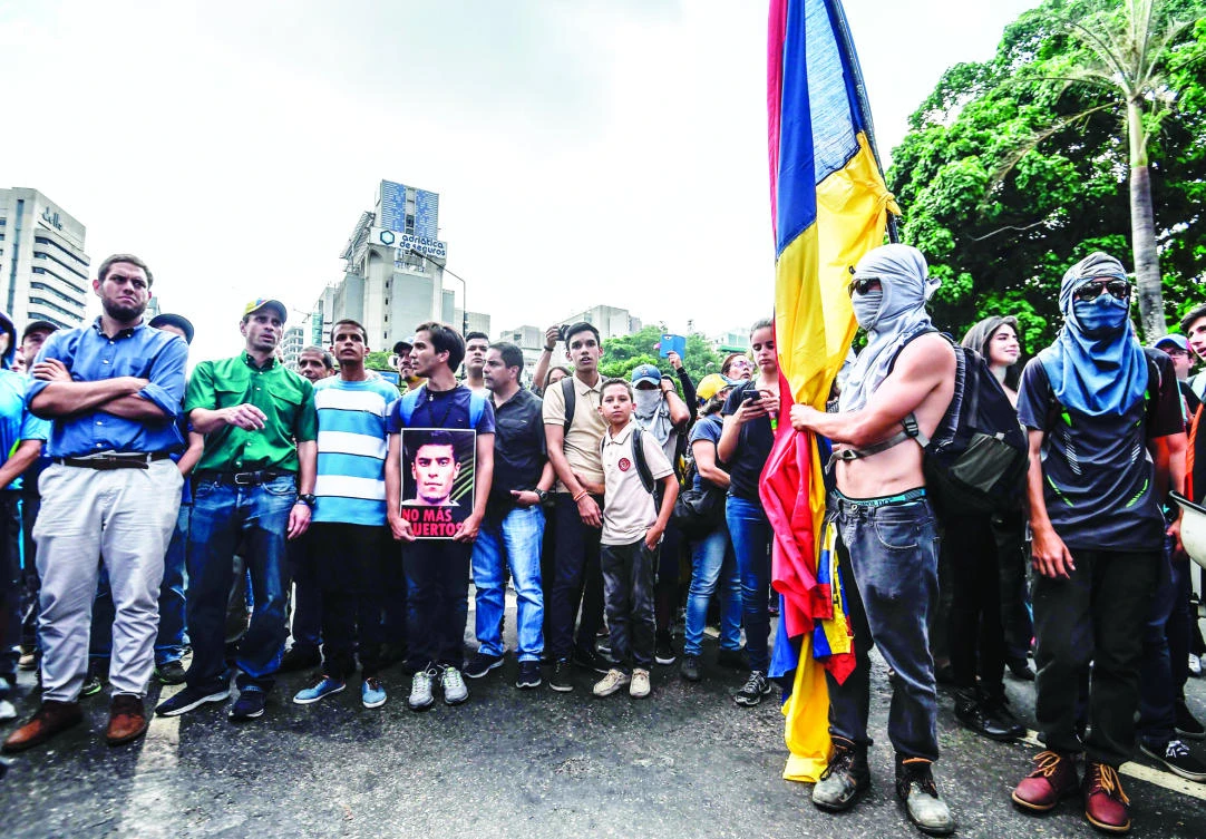 Henrique Capriles, Venezuelan opposition leader, takes part in a march in Caracas. (AFP)