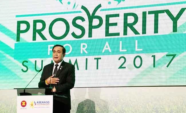 Thailand's Prime Minister Prayut Chan-O-Cha speaks at a forum on the sidelines of the Association of Southeast Asian Nations (ASEAN) summit in Manila on Friday. (AFP)