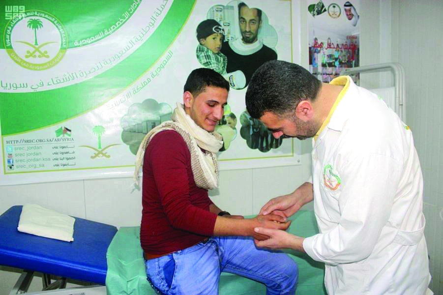 A Syrian refugee receives medical treatment at a specialized clinic at Zaatari camp in Jordan. (SPA)
