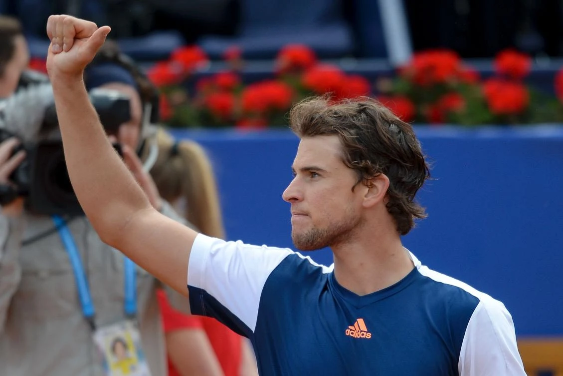 Dominic Thiem celebrates his victory over Andy Murray in Barcelona on Saturday. (AFP)