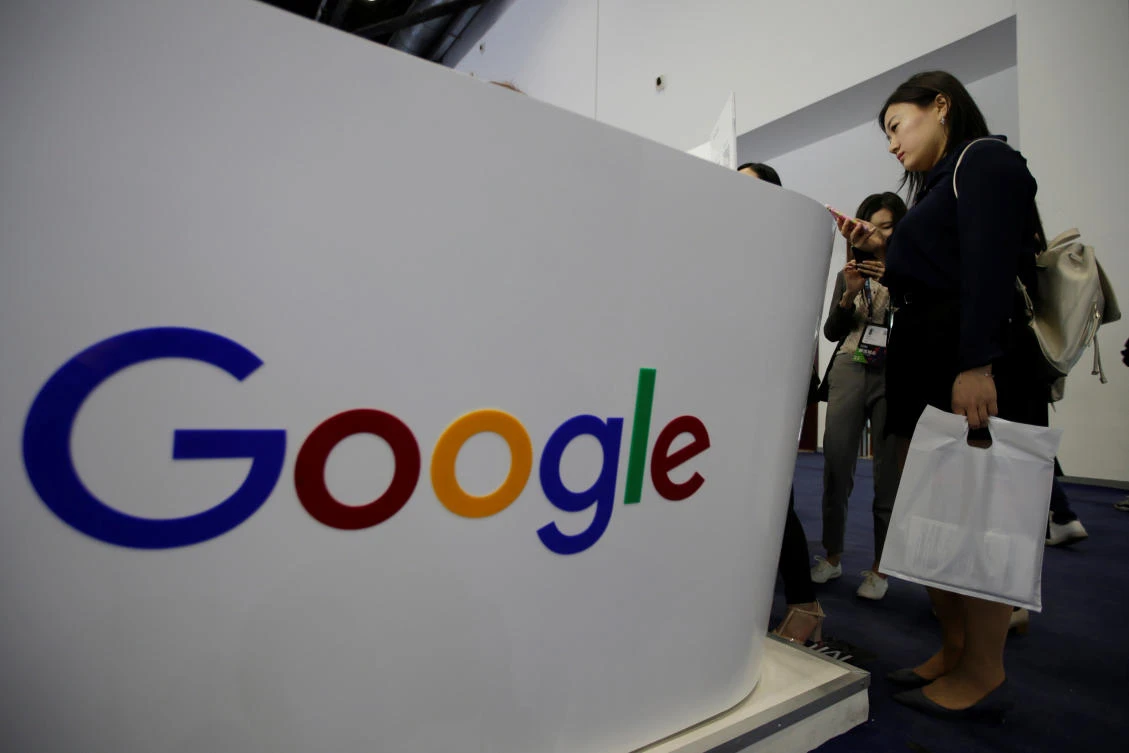 People visit Google's booth at the Global Mobile Internet Conference (GMIC) 2017 in Beijing, China. (Reuters)