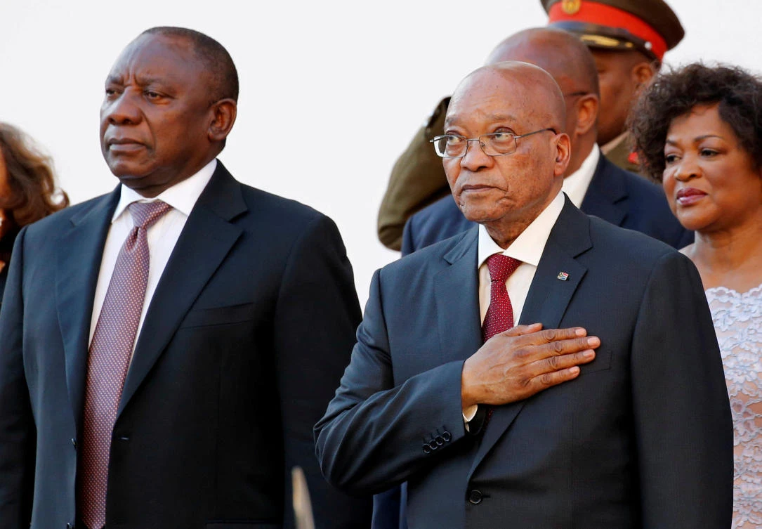 South Africa's Deputy President Cyril Ramaphosa (L) and President Jacob Zuma listen to the national anthem. (Reuters)