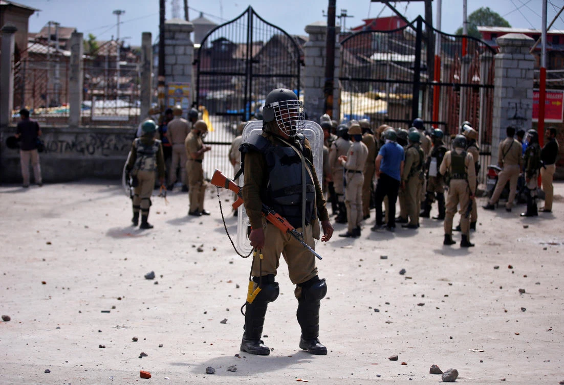 An Indian policeman stands guard during a protest in Srinagar. (REUTERS/Danish Ismail)