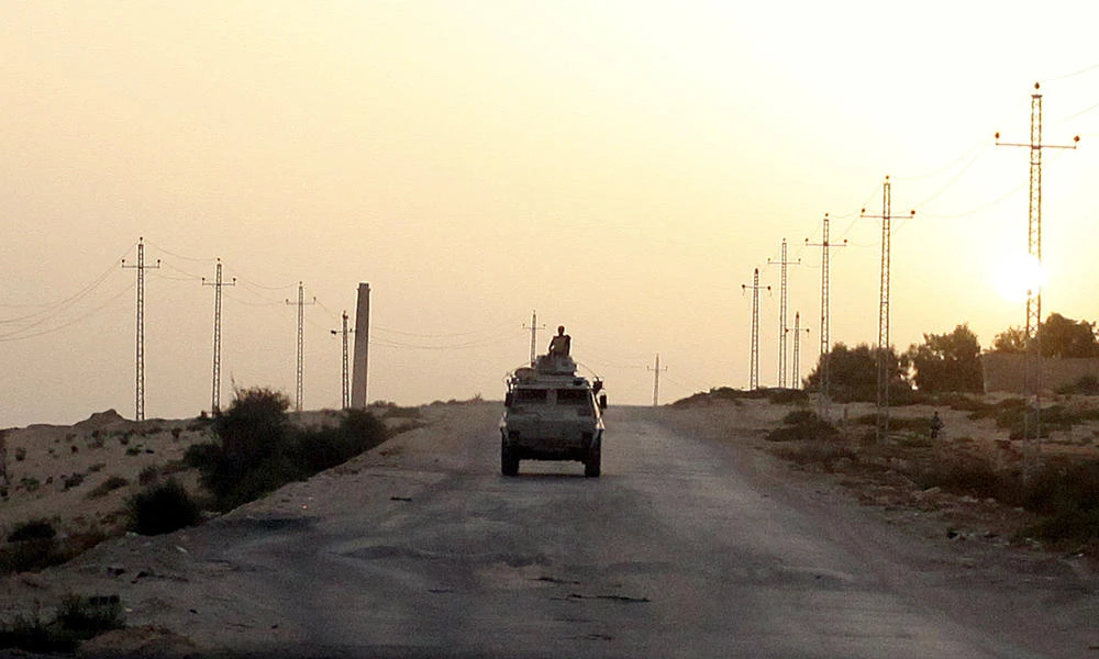 An Egyptian military vehicle is seen on the highway in northern Sinai, Egypt, in this May 25, 2015 file photo. Tribesmen in Sinaion Tuesday killed eight suspected Daesh fighters in battle and captured three more, officials said. (Reuters file photo)