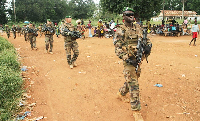 French Sangaris legionnaires from the Tactical Inter-forces Group Centurion patrol the market in Sibut north of Bangui, in this September 25, 2015 file photo. (AFP)