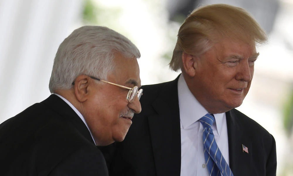 US President Donald Trump welcomes Palestinian President Mahmoud Abbas at the White House in Washington, DC, on Wednesday. (REUTERS/Carlos Barria)