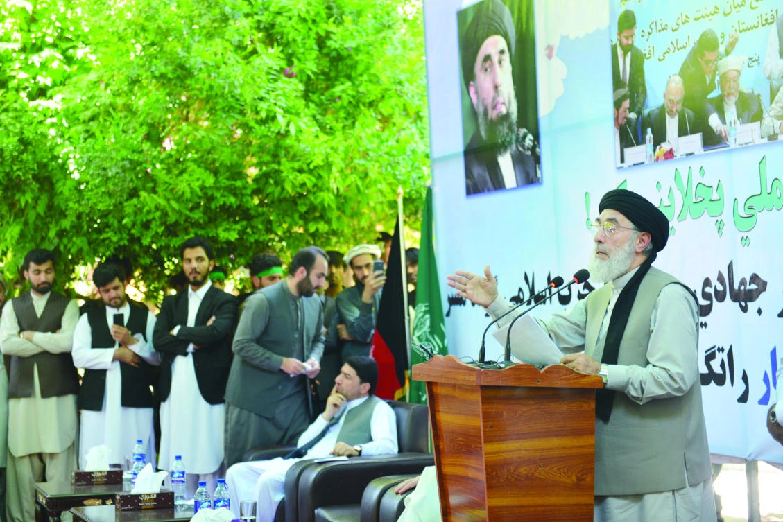 Warlord Gulbuddin Hekmatyar gives a speech in Mihtarlam city, capital of eastern Laghman province, Afghanistan, Saturday.(AP