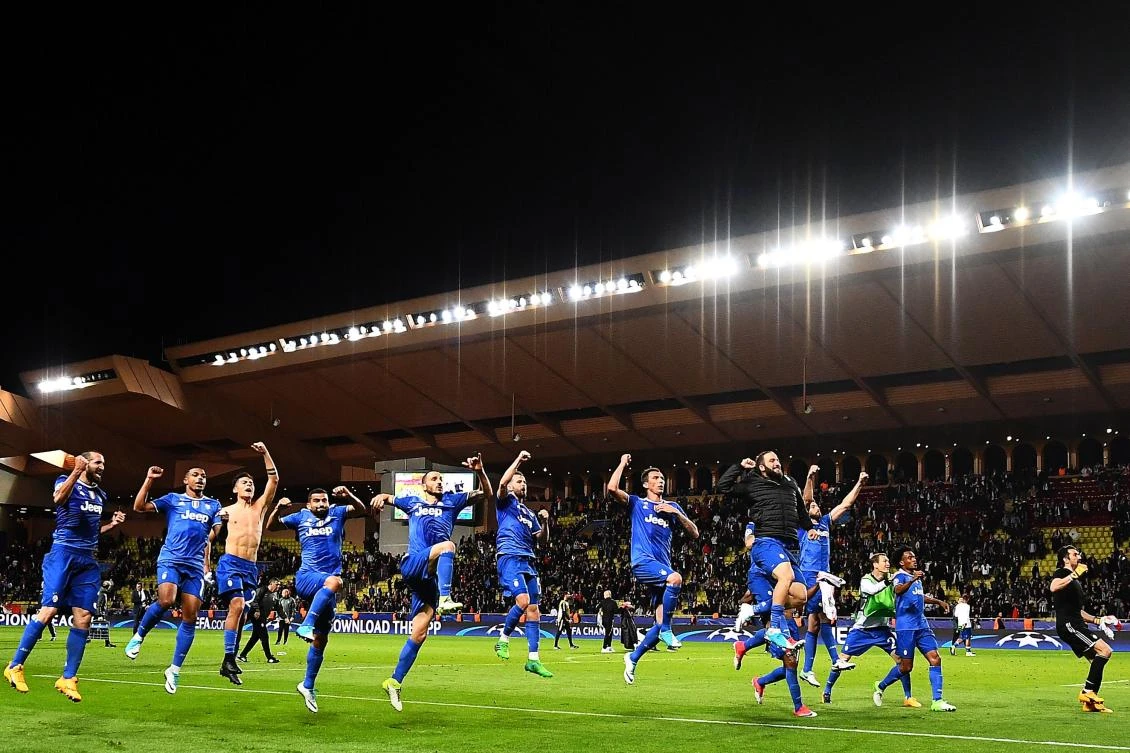 Juventus' forward from Argentina Gonzalo Higuain (black jacket) who scored 2 goals celebrates with teammates their 2-0 win over Monaco during the UEFA Champions League semifinal first leg football match Monaco vs. Juventus at the Stade Louis II stadium in Monaco on Wednesday. (AFP)