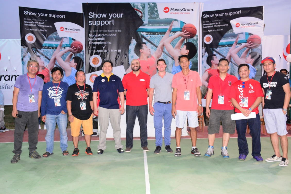 Organizers with sponsors in a group photo. From left, Jerry Lagrimas, two table committee members, Vice Consul Alex Estomo, MoneyGram's Ahmed Khasawneh, Max Palothorpe, FCBL President Noel Miguel, Willy Cartegena, FCBL Commissioner Robert Jose and FCBL Coordinator Elmer Perez.