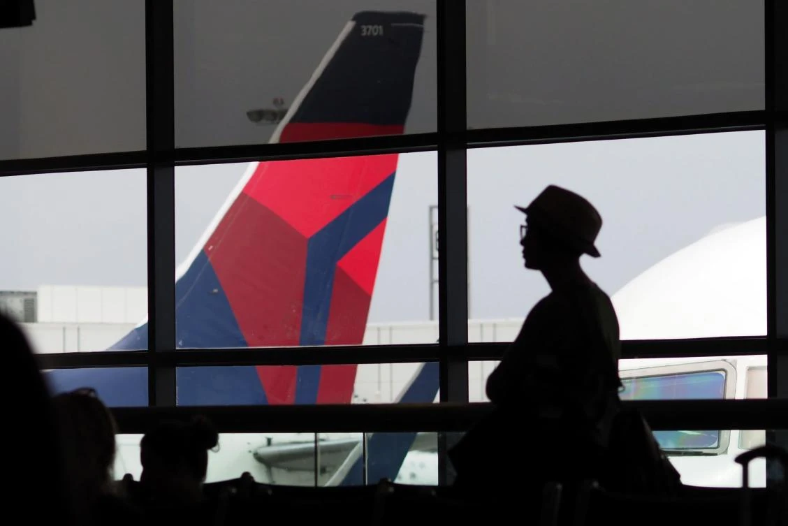 Delta Air Lines apologizes for forcing family off flight