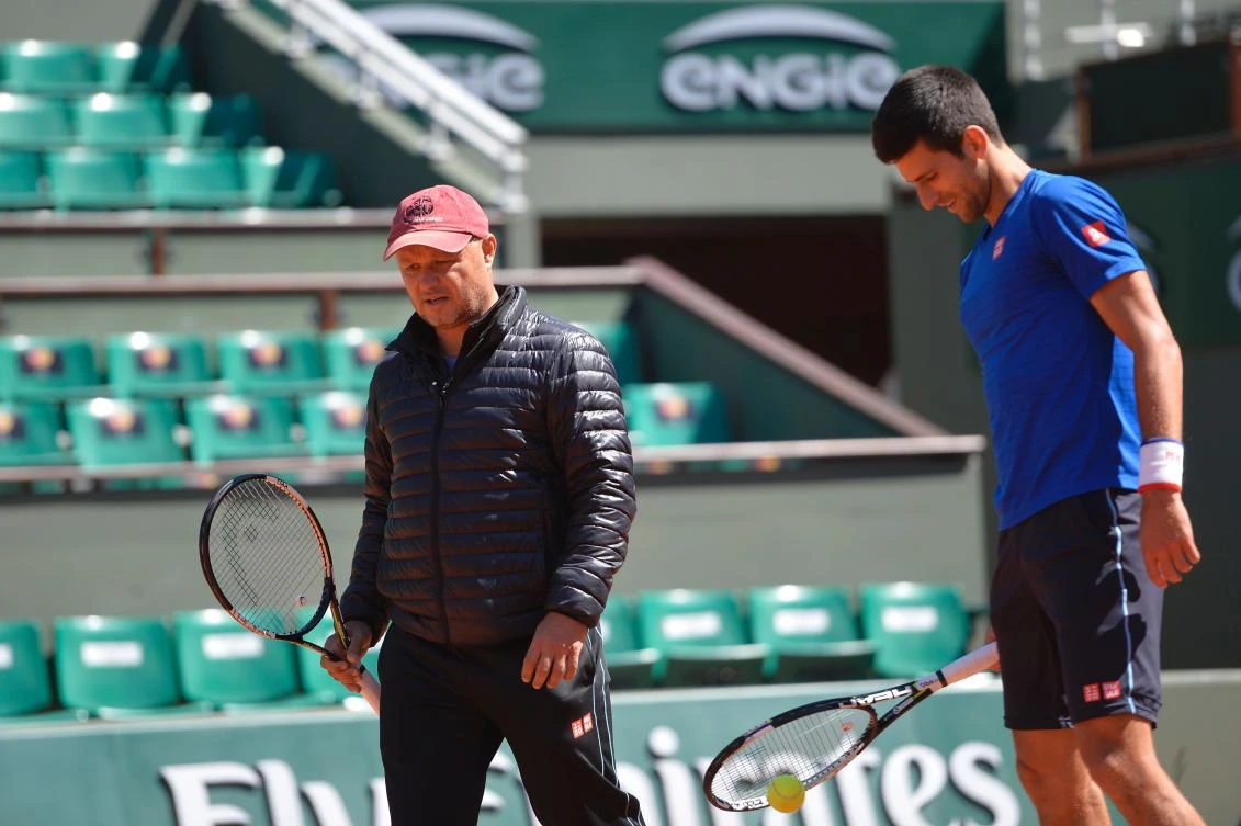 Novak Djokovic and his coach Marian Vajda, left, during a training session prior the 2015 French Open tennis championships at the Roland Garros stadium in Paris. (AFP)