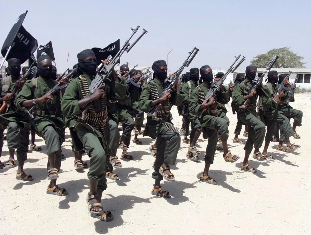 Al-Shabab fighters perform military exercises. (AP)