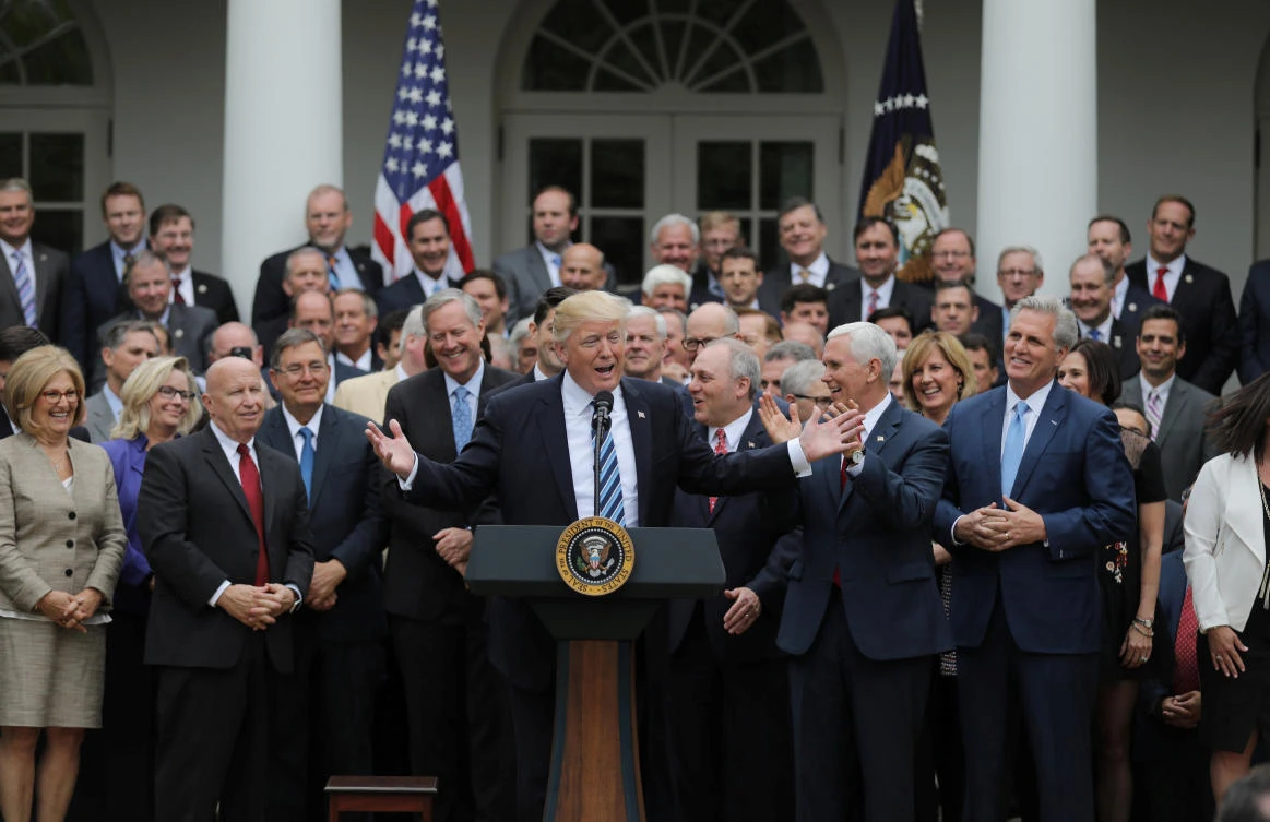 US President Donald Trump (C) gathers with Congressional Republicans in the White House in Washington, D.C. after the House of Representatives approved the American Healthcare Act on May 4, 2017. On Friday, Trump signed a $1 trillion spending bill to keep the government operating through September. (REUTERS/Carlos Barria)